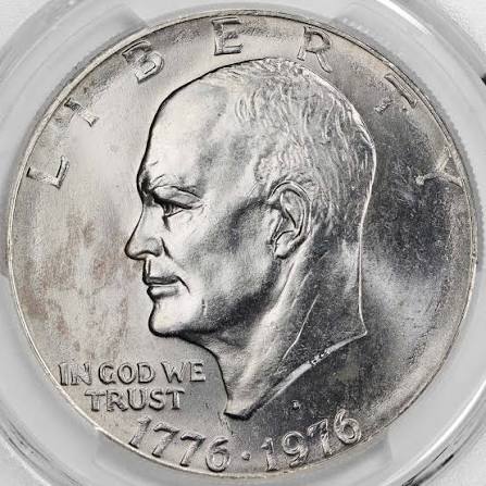 1976 Eisenhower dollar design struck on wrong-denomination smaller planchet showing size discrepancy